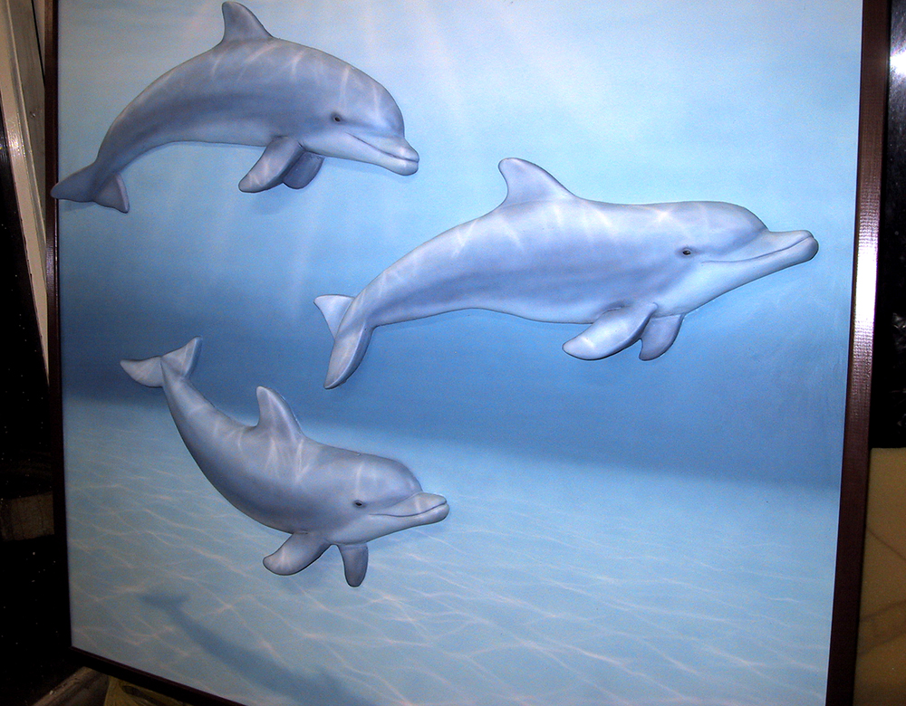 Dolphins in relief